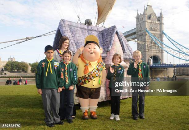Mohammed Davdali, aged 10, Cub Scouts leader Helen Peberday, Charlotte Lacy, aged 9, Disney character Russell, Carmen Calland, aged 8, and Ethan...