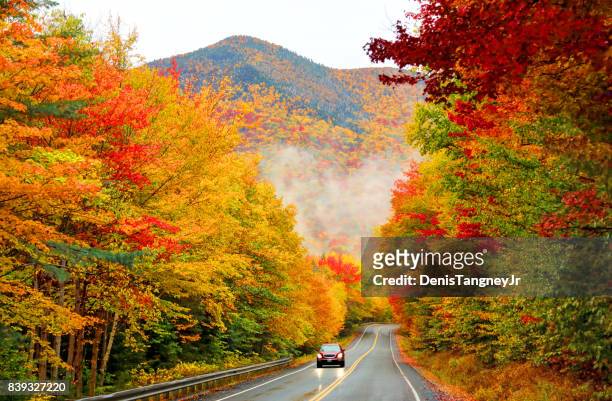 kancamagus highway in northern new hampshire - autumn car stock pictures, royalty-free photos & images