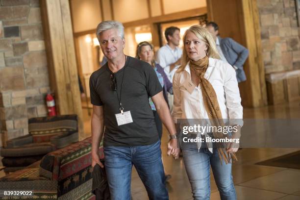 Christopher "Chris" Waller, senior vice president of the Federal Reserve Bank of St. Louis, left, arrives with Laurie Waller for a dinner during the...