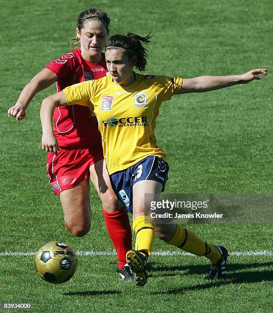Trudy Camilleri of Mariners is tackled by Sarah Amorim of the United during the round seven W-League match between Adelaide United and the Central...