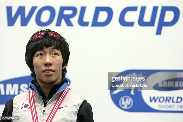 Gold medalist Lee Ho-suk of South Korea celebrates on the podium at the award ceremony after the Men's 1000m final during the Samsung ISU World Cup...