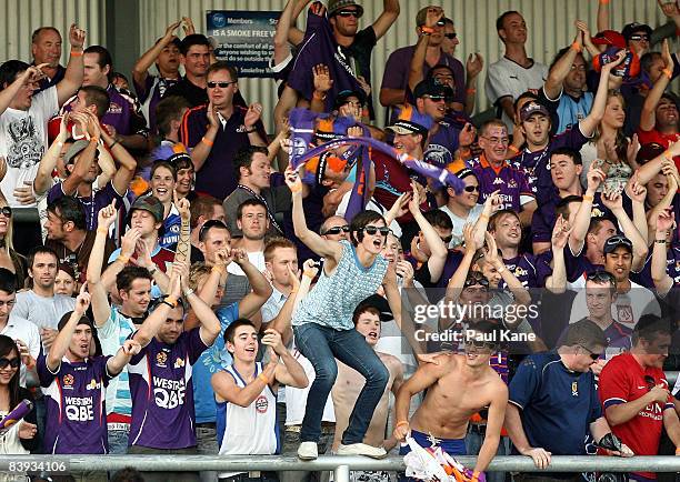 Glory fans celebrate victory in the round 14 A-League match between the Perth Glory and the Melbourne Victory held at Members Equity Stadium December...