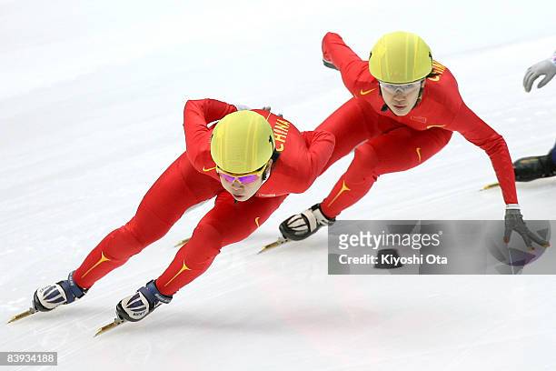 Wang Meng of China and Liu Qiuhong of China compete in the Ladies 1000m final during the Samsung ISU World Cup Short Track 2008/2009 Nagano at Big...