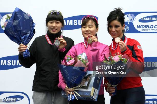 Silver medalist Shin Sae-bom of South Korea, gold medalist Kim Min-jung of South Korea and bronze medalist Allison Baver of the U.S. Pose for...