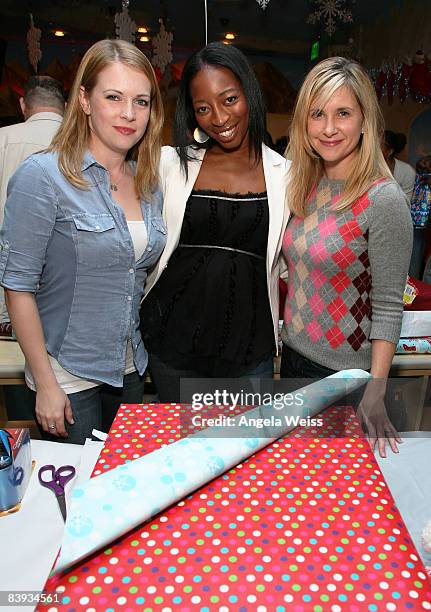 Actresses Melissa Joan Hart, Dawn Ballard and Kellie Martin attend the Baskin Robbins "Wrapped With A Bow" event at Giggles 'n Hugs on December 5,...