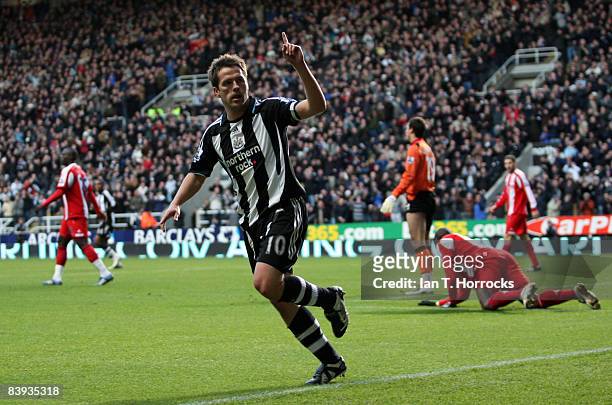 Michael Owen of Newcastle United celebrates after scoring the opening goal during the Barclays Premier League match between Newcastle United and...