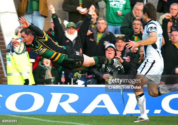 Paul Diggin of Northampton Saints scores the first try of the game during the European Challenge Cup match between Northampton Saints and Bristol...