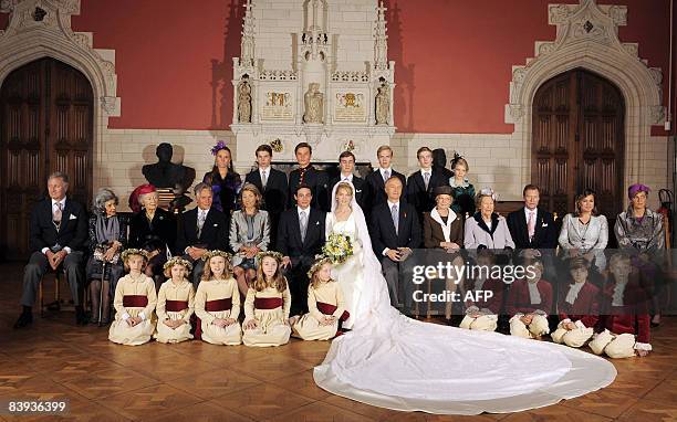 Archduchess Marie-Christine of Austria and Count Rodolphe of Limburg Stirum pose for a family photo after their civil wedding at Michelen's City Hall...