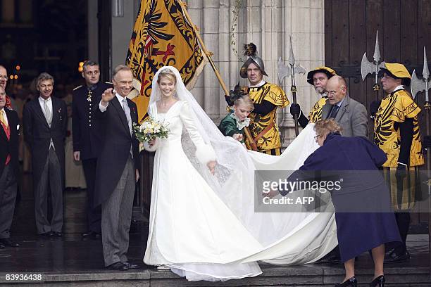 Archduchess Marie-Christine of Austria and her father Archduke Christian of Austria stand on the steps of the 'Sint-Romboutskathedraal' , before her...