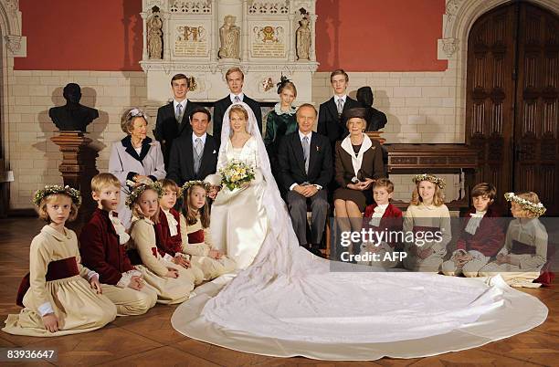 Archduchess Marie Christine of Austria and Count Rodolphe of Limburg Stirum pose for a family picture after their civil wedding at the City Hall of...