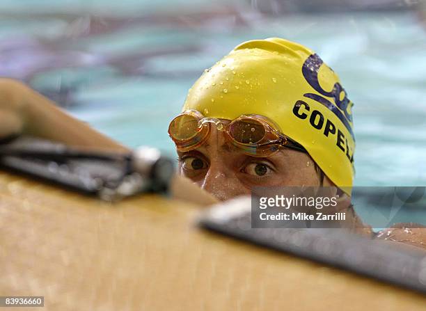 Williams Copeland takes a breather after the preliminaries of the 100 yard freestyle during the 2008 Short Course National Championships at the...