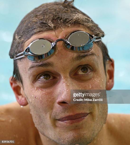 Eric Chanteau looks at the scoreboard after swimming in the preliminaries of the 200 yard breaststroke during the 2008 Short Course National...