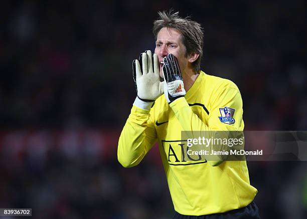 Edwin van der Sar of Manchester United shouts to his team mates during the Barclays Premier League match between Manchester United and Sunderland at...