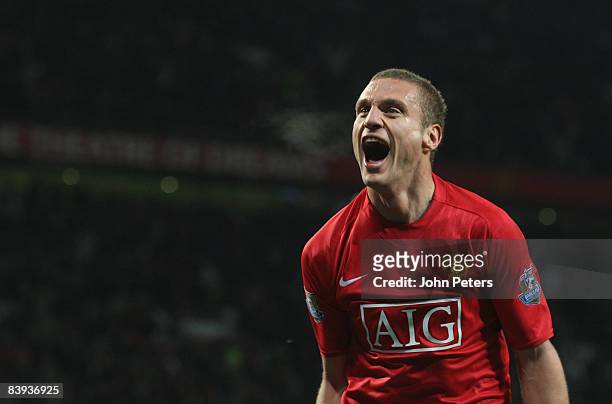 Nemanja Vidic of Manchester United celebrates scoring their first goal during the Barclays Premier League match between Manchester United and...