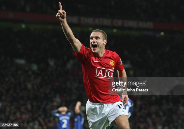 Nemanja Vidic of Manchester United celebrates scoring their first goal during the Barclays Premier League match between Manchester United and...