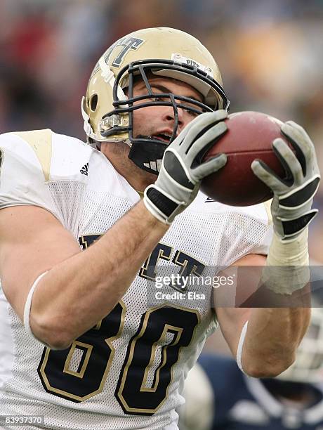 Nate Byham of the Pittsburgh Panthers makes the catch and runs it in for a touchdown in the second half against the Connecticut Huskies on December...