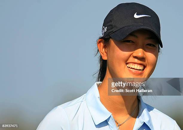 Michelle Wie smiles on the 15th hole during the fourth round of the LPGA Qualifying School at LPGA International on December 6, 2008 in Daytona...