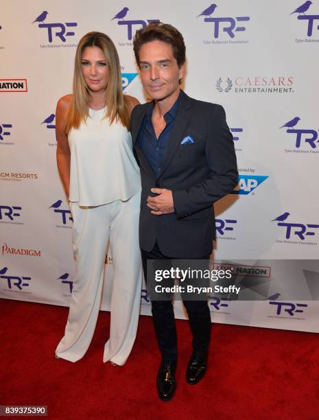 Television host/model Daisy Fuentes and musician Richard Marx arrive at the Tyler Robinson Foundation's 4th annual 'Believer Gala' at Caesars Palace...
