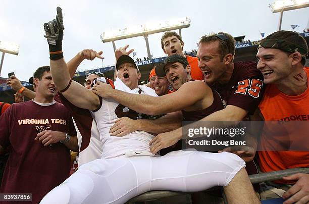 Linebacker Dylan McGreevy of the Virginia Tech Hokies celebrates with fans after defeating the Boston College Eagles in the 2008 ACC Football...