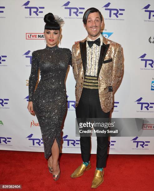 Singer and burlesque dancer Melody Sweets and The Gazillionaire from "Absinthe" attend the fourth annual Tyler Robinson Foundation gala benefiting...