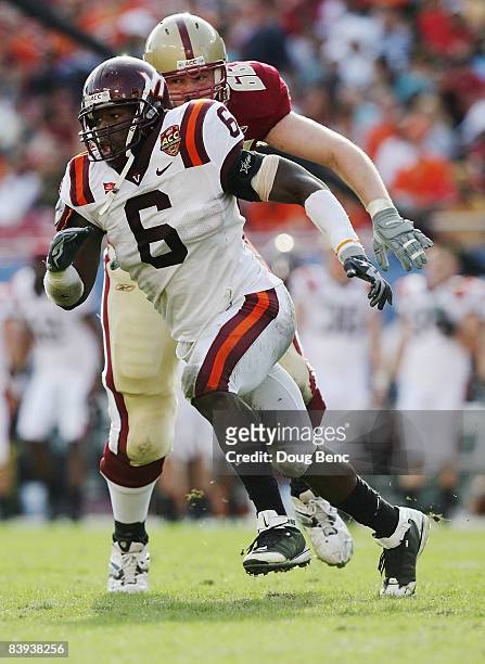 Defensive end Jason Worilds of the Virginia Tech Hokies gets past offensive tackle Rich Lapham of the Boston College Eagles in the 2008 ACC Football...