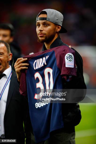 Golden State Warrior NBA player Stephen Curry attends the French championship L1 football match between Paris Saint-Germain and Saint-Etienne , on...
