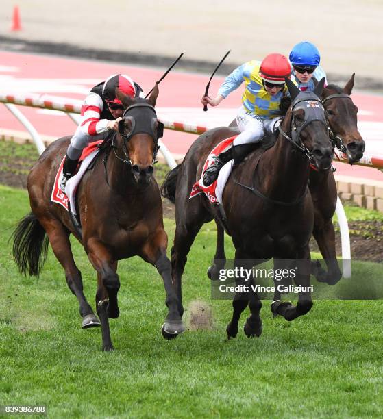 Ben Melham riding MissRock defeats Damian Lane ridng Heatherly in Race 7, Carlyon Stakes during Melbourne Racing at Moonee Valley Racecourse on...