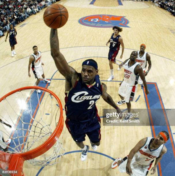 LeBron James of the Cleveland Cavaliers dunks against the Charlotte Bobcats on December 06, 2008 at the Time Warner Cable Arena in Charlotte, North...