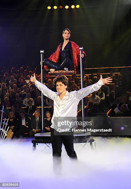 Comedian Oliver Pocher and actress Susan Hoecke perform on stage during Stars In Der Manege At on December 6, 2008 in Munich, Germany.