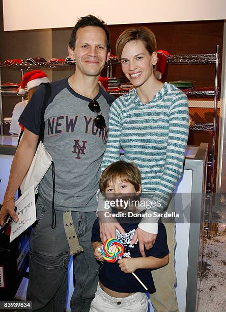 John Campisi, actress Hilary Swank and guest attend the Lacoste at MilkShop.com Winter Wonderland holiday event on December 6, 2008 in Los Angeles...