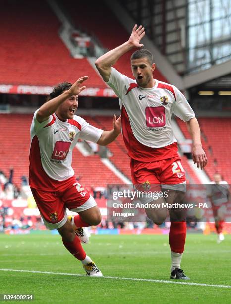 Stevenage's John Mousinho celebrates with team mate Lawrie Wilson after scoring the opening goal of the game during the npower League Two Play-Off...