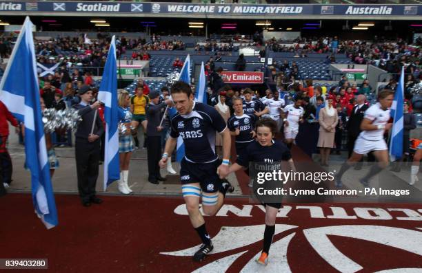 Scotland's Scott Riddell walks on to the pitch for the Emirates Airline Edinburgh Sevens at Murrayfield Stadium, Edinburgh.