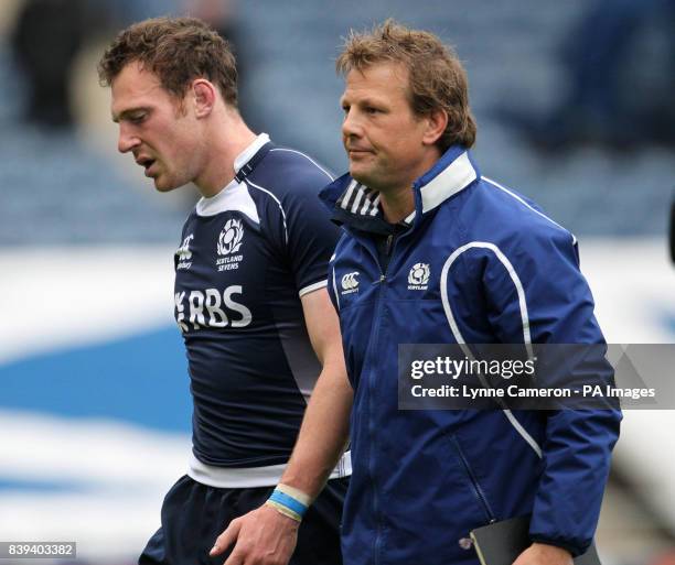 Scotland's Graham Sheil and Scott Riddell react after failing to qualify for the Cup during the Emirates Airline Edinburgh Sevens at Murrayfield...