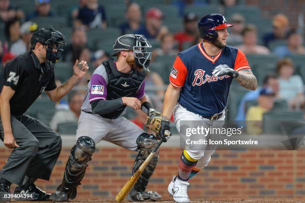 Atlanta pinch hitter Matt Adams grounds a ball to shortstop during a game between the Colorado Rockies and the Atlanta Braves on August 25, 2017 at...