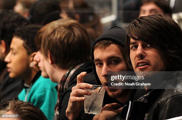 Musicians of the band Gym Class Heroes attend the NHL game between the Columbus Blue Jackets and the Los Angeles Kings on December 6, 2008 at Staples...