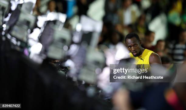 Usain Bolt of Jamacia speaks to the media after the 100m final during day two of the 16th IAAF World Athletics Championships London 2017 at The...