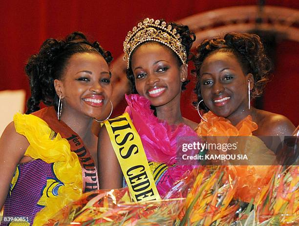 Miss Ecowas Ivorian Manie Murielle , Vice Miss Hann Fatoumata of Guinea and third placed Uchechi Unubia of Nigeria pose during a beauty contest of...