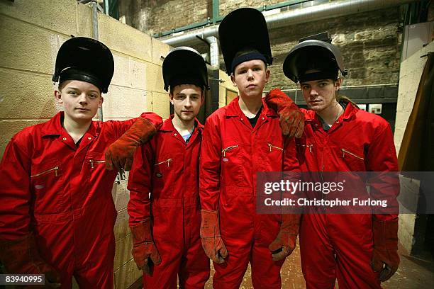 Apprentices, from the left, Oliver Rowland, aged 16, Sam Stott Craig Stokes 17 and John Dixon 18, pose at the Cammell Laird shipyard where they are...