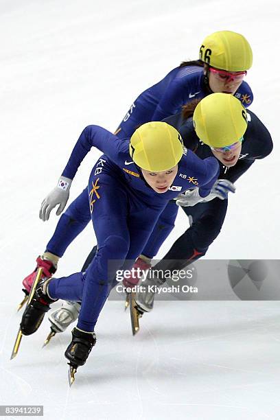 Shin Sae-bom of South Korea competes with Katherine Reutter of the USA and Kim Min-jung of South Korea in the Ladies 1500m final during the Samsung...