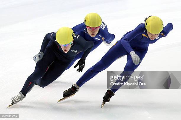 Katherine Reutter of the USA, competes with Shin Sae-bom of South Korea and Kim Min-jung of South Korea in the Ladies 1500m final during the Samsung...