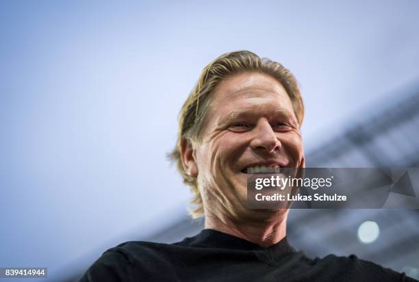 Head Coach Markus Gisdol of Hamburg smiles prior to the Bundesliga match between 1. FC Koeln and Hamburger SV at RheinEnergieStadion on August 25,...