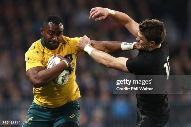 Tevita Kuridrani of the Wallabies is tackled by Ryan Crotty of the All Blacks during The Rugby Championship Bledisloe Cup match between the New...