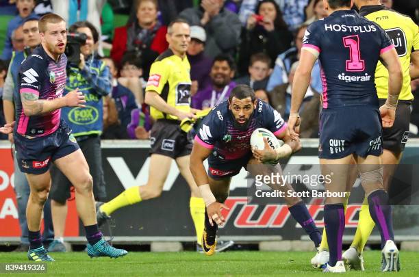 Josh Addo-Carr of the Storm runs in to score a try during the round 25 NRL match between the Melbourne Storm and the South Sydney Rabbitohs at AAMI...