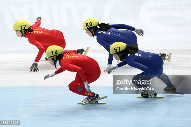 The Chinese team and South Korean team compete in the Ladies' 3000m Relay final during the Samsung ISU World Cup Short Track 2008/2009 Nagano at the...