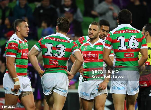 Robbie Farah and Rabbitohs players look dejected after the Storm score a try during the round 25 NRL match between the Melbourne Storm and the South...