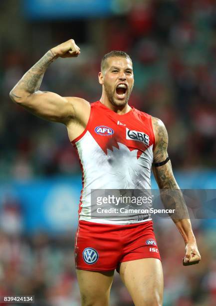 Lance Franklin of the Swans celebrates scoring his tenth goal during the round 23 AFL match between the Sydney Swans and the Carlton Blues at Sydney...
