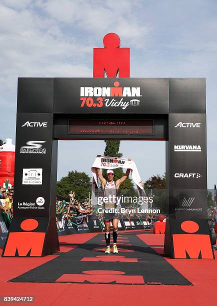 Frederik Van Lierde of celebrates winning IRONMAN 70.3 Vichy on August 26, 2017 in Vichy, France.