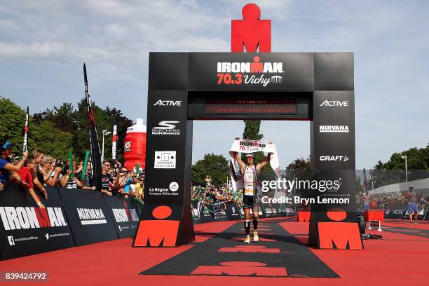 Frederik Van Lierde of celebrates winning IRONMAN 70.3 Vichy on August 26, 2017 in Vichy, France.