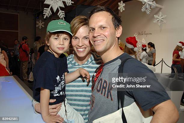 Actress Hilary Swank and John Campisi attends the Milkshop.com Winter Wonderland at 5th and Sunset Studios on December 6, 2008 in Los Angeles,...
