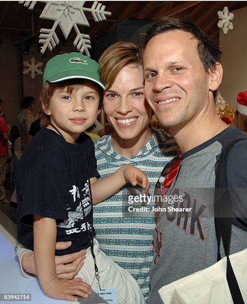Actress Hilary Swank and John Campisi attends the Milkshop.com Winter Wonderland at 5th and Sunset Studios on December 6, 2008 in Los Angeles,...
